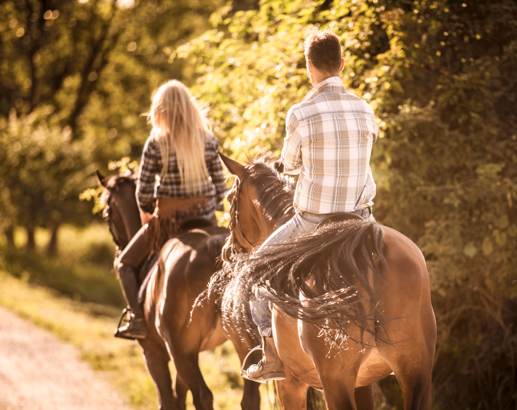 People horseback riding.